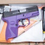 Taurus G2C 9mm Used Trade-In Pistol with Two Magazines and Dark Purple Frame