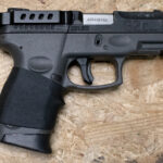 Taurus G2C 9mm Police Trade-In Pistol with Rubber Grip Sleeve and Belt Clip
