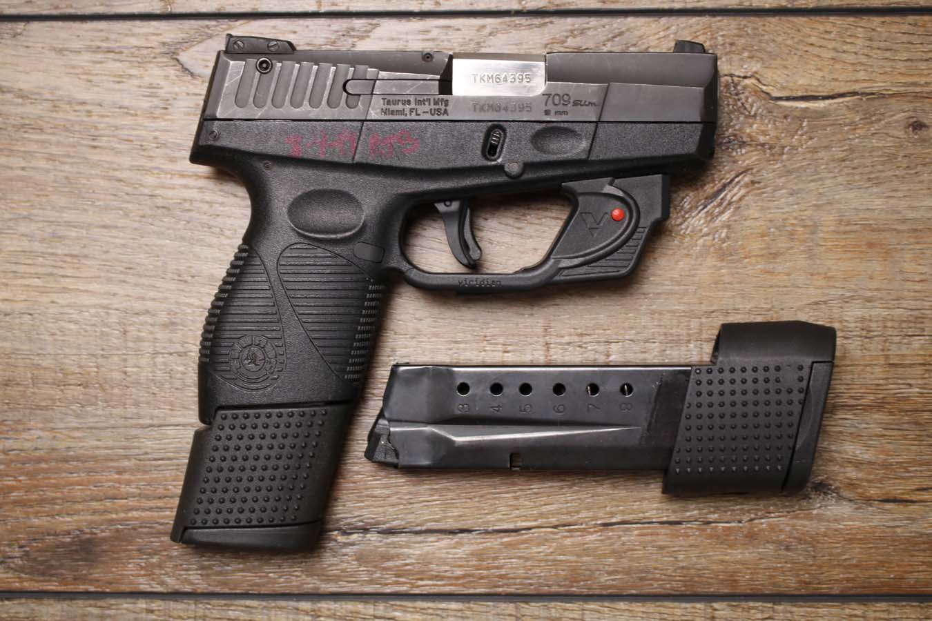 159614-default-l Taurus PT709 Slim 9mm Police Trade-In Pistol with Laser