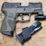 Taurus G2C 9mm Police Trade-In Pistol with Green Frame and Laser