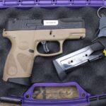 Taurus PT111 G2 Millennium 9mm Police Trade-In Pistol with Tan Frame, Case, and Two Magazines