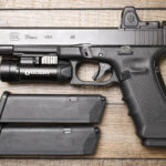 Glock 35 Gen 4 MOS 40 S&W Police Trade-In Pistol with Trijicon RMR Red Dot and PL-2 Light