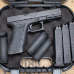 Glock 22Gen4 40 S&W Police Trade-In Pistol with Additional Mags and Case