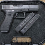 Glock 22 Gen3 40 S&W Police Trade-In Pistol with Three Magazines and Case