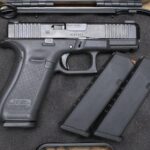 Glock 45 9mm Police Trade-In Pistol with AmeriGlo Sights, Three Magazines and Case