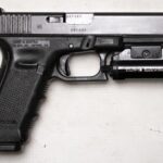 Glock 22 Gen4 40 S&W Police Trade-in Pistol with TLR-1s Weapon Light