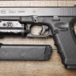 Glock 22 Gen 4 40 S&W Police Trade-In Pistol with TLR-1S Light