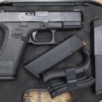 Glock 45 9mm Police Trade-In Pistol with AmeriGlo Sights, Three Magazines, Backstraps, and Case