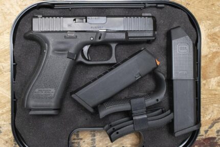 Glock 45 9mm Police Trade-In Pistol with AmeriGlo Sights, Three Magazines, Backstraps, and Case